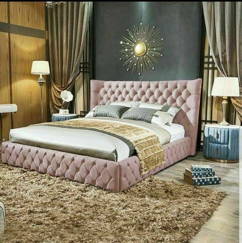 Winged bed frame upholstered